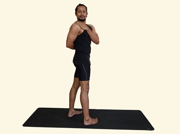 Ayurveda Kapha-Pacifying Yoga: Standing Spinal Twist | Banyan Botanicals