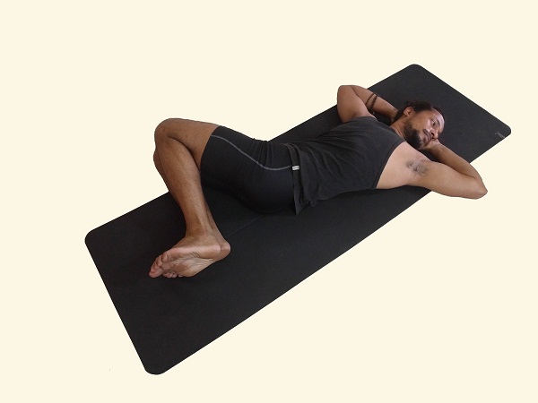 Supta-Udarakarshanasana–Sleeping-Abdominal-stretch-Pose