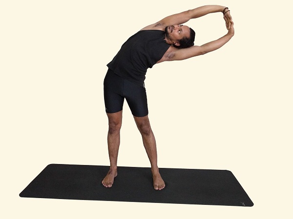 Tiryaka Talasana - Swaying Palm Tree Posture